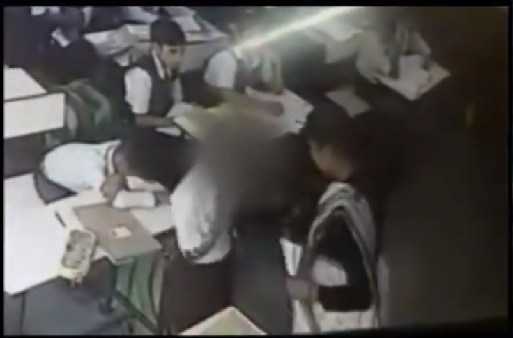 Teacher slapping student