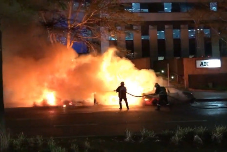 An Uber taxi on fire