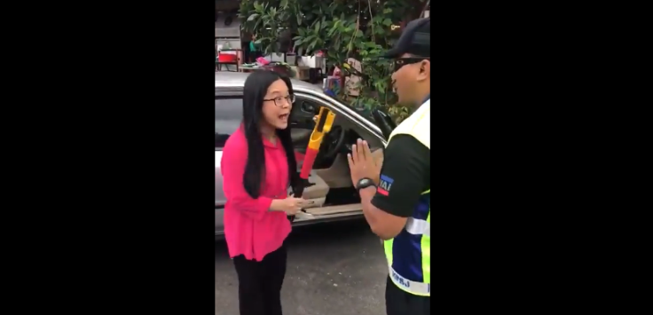 woman threatening council officer with a steering lock 