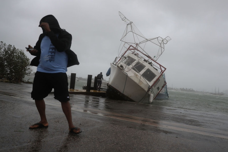 Man uses mobile phone during storm irma