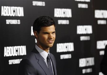 Cast member Taylor Lautner poses at the world premiere of Abduction at the Graumans Chinese theatre in Hollywood, California September 15, 2011. The movie opens in the U.S.