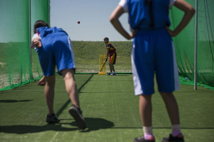 children playing cricket