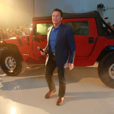 Arnold Schwarzenegger with electric Hummer