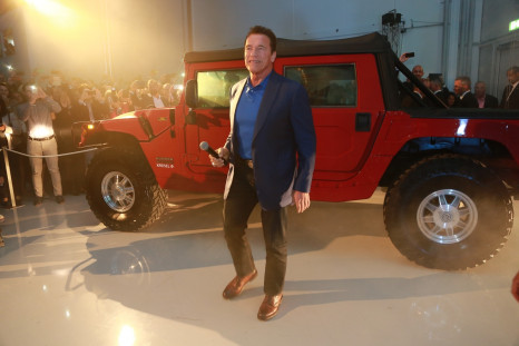 Arnold Schwarzenegger with electric Hummer