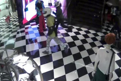 The moped gang raid a Prada store in Bond Street, London, last month