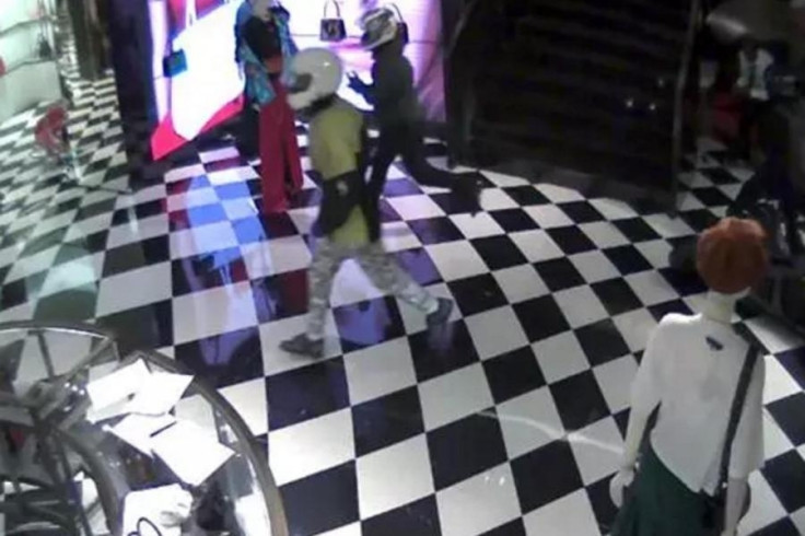 The moped gang raid a Prada store in Bond Street, London, last month