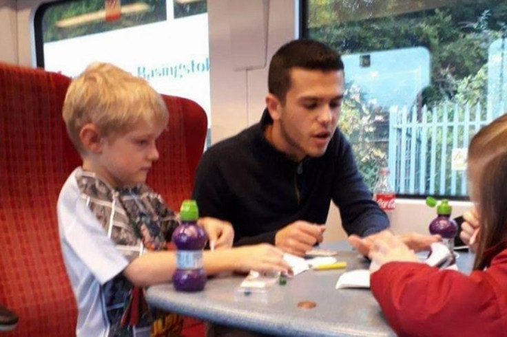 Daniel Ball lends a hand by plays with Jack, who has autism, and his sister Amy in an image posted by his mother Gayna Pealling