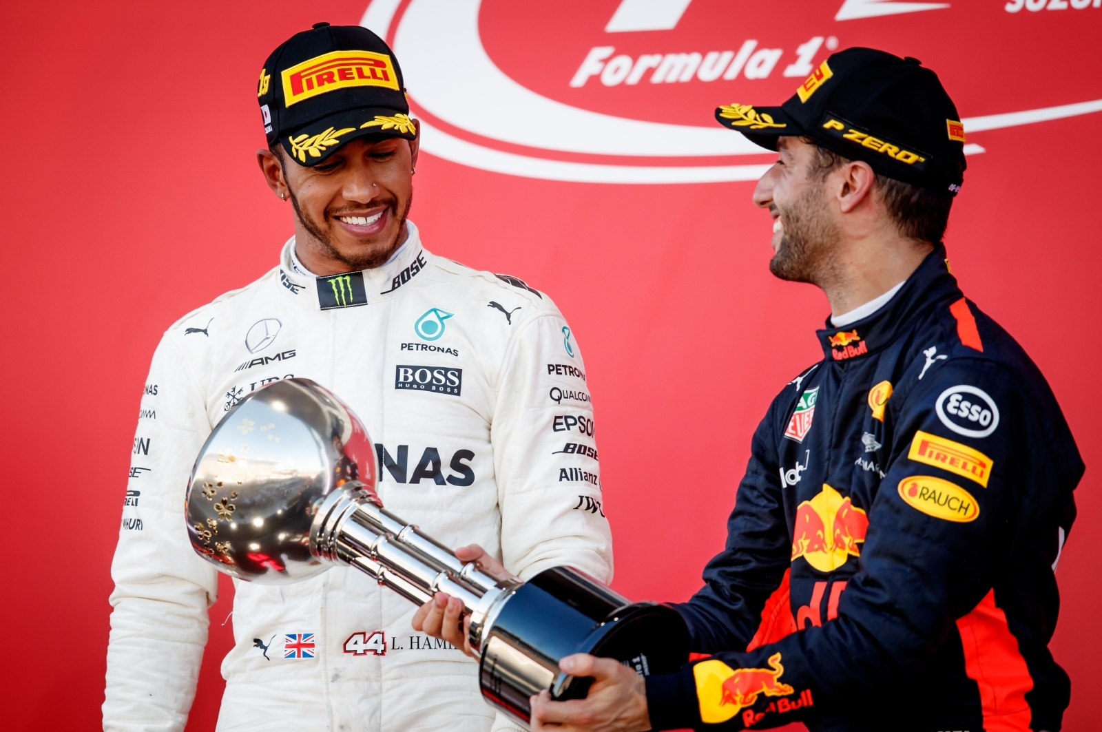 Lewis Hamilton clinches Japanese Grand Prix after Sebastian Vettel is ...