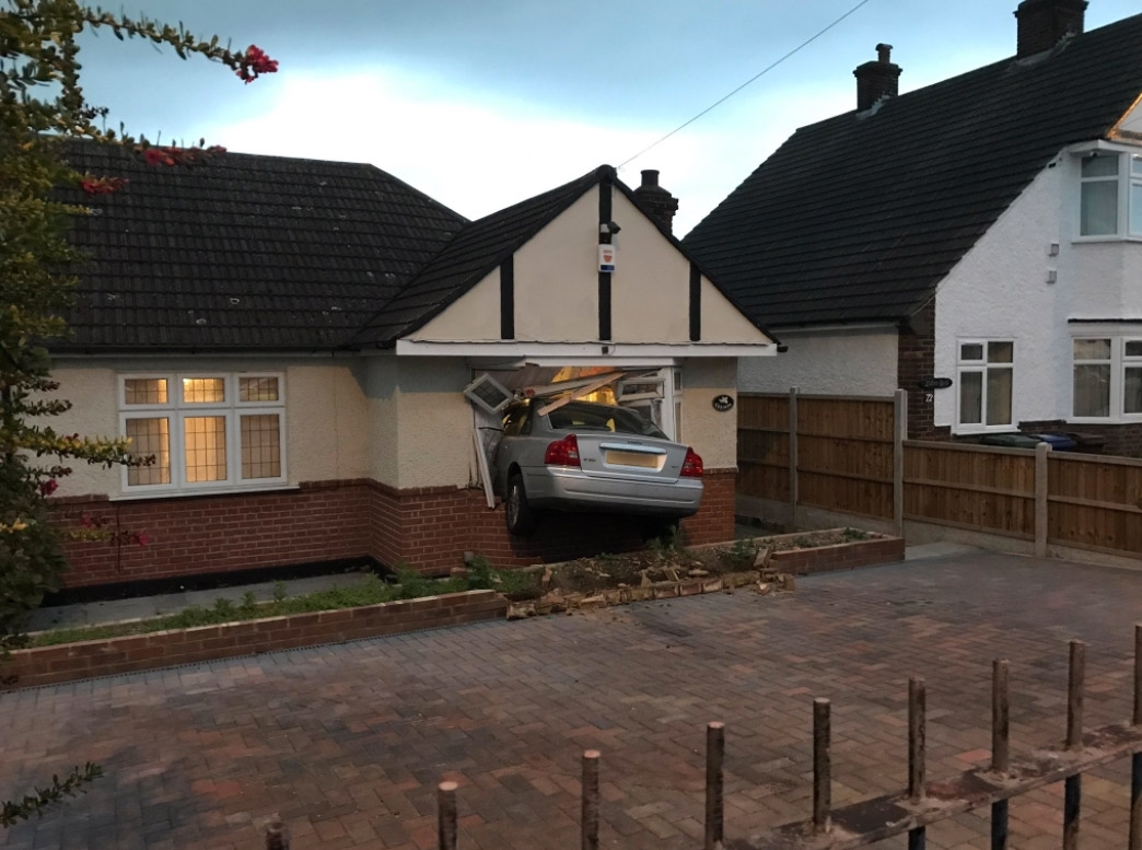 Man drove car into own home Man drove car into own home