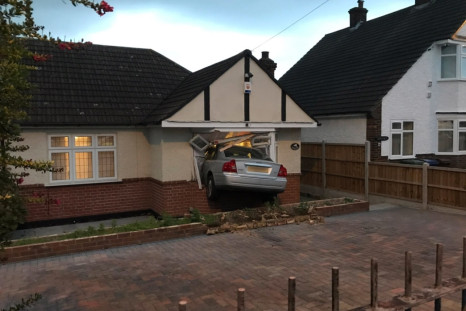 Man drove car into own home