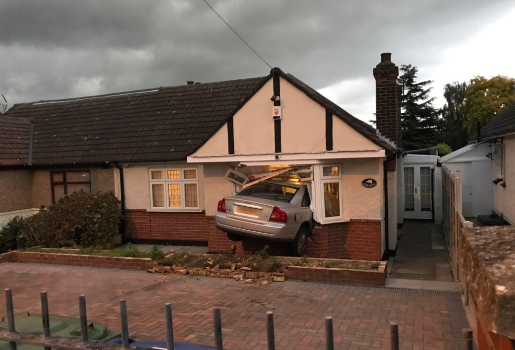 Car crashed into home Car crashed into home