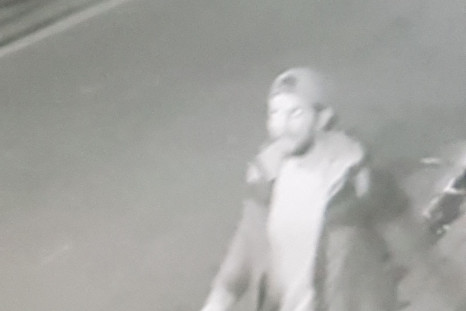 A CCTV camera picks up the girl stumbling down a side street near Bethnal Green station, east London, being followed by a different, bearded male, on a racing bicycle, who is believed to be the second suspect