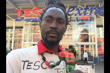 who was sacked from Tesco after accusations of stealing has spent the night protesting in the supermarket's roof