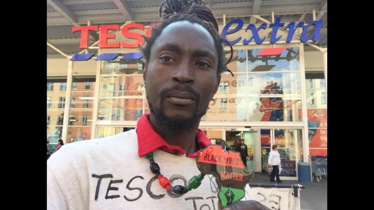 who was sacked from Tesco after accusations of stealing has spent the night protesting in the supermarket's roof