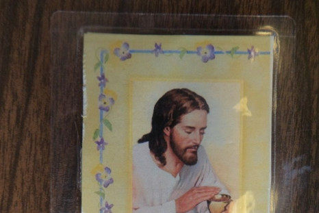 Prayer card used for smuggling