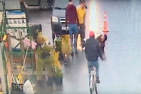 CCTV footage shows Pavel Luzyanin standing above barber Dany-Dastan Adkhamov who he stabbed because he did not like his haircut