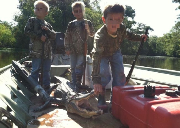 Kids dead alligator hunting