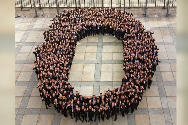 Hundreds of German finance ministry staff form a zero to celebrate the balanced budgets delivered by German finance minister Wolfgang Schäuble as he leaves office