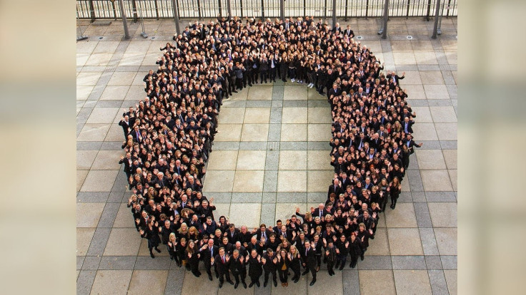 Hundreds of German finance ministry staff form a zero to celebrate the balanced budgets delivered by German finance minister Wolfgang Schäuble as he leaves office