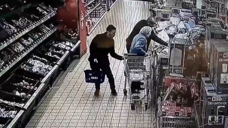 Outrageous footage shows 87- year old woman distracted so man can take her purse