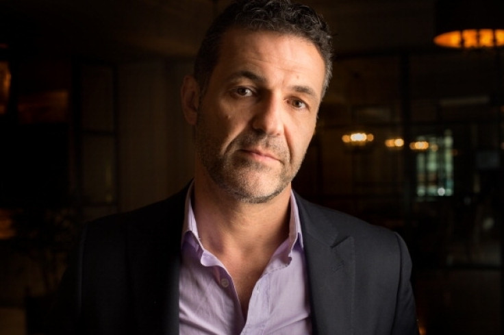 Author Khaled Hosseini sits for an interview about his latest novel 'And the Mountains Echoed” in Washington, D.C., on Thursday, May 23, 2013