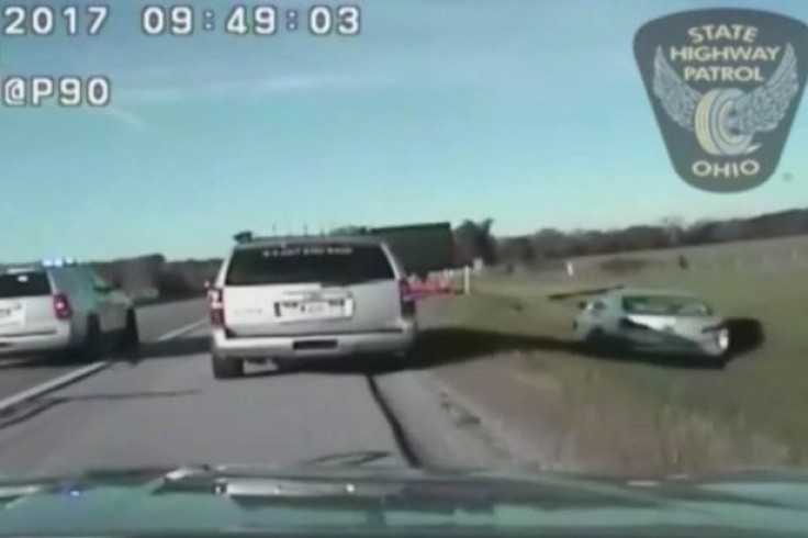 The 10-year-old boy is forced into a ditch to avoid spikes laid by police on the highway
