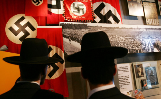Jews in front of Swastikas