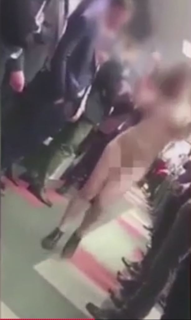 This is the moment woman parades naked through an office in a The Wolf of Wall Street-style stunt set up by her boss This is the moment woman parades naked through an office in a The Wolf of Wall Street-style stunt set up by her boss