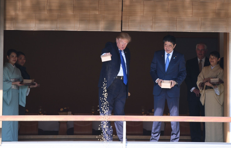 donald trump shinzo abe koi fish