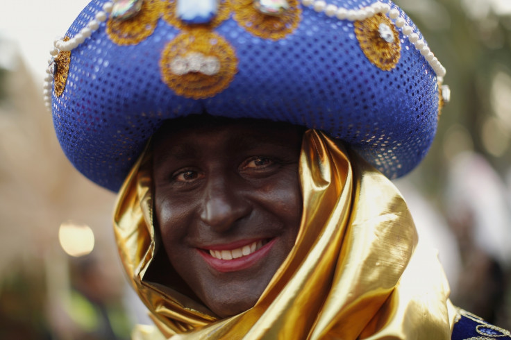 Man dressed as Balthazar with black face