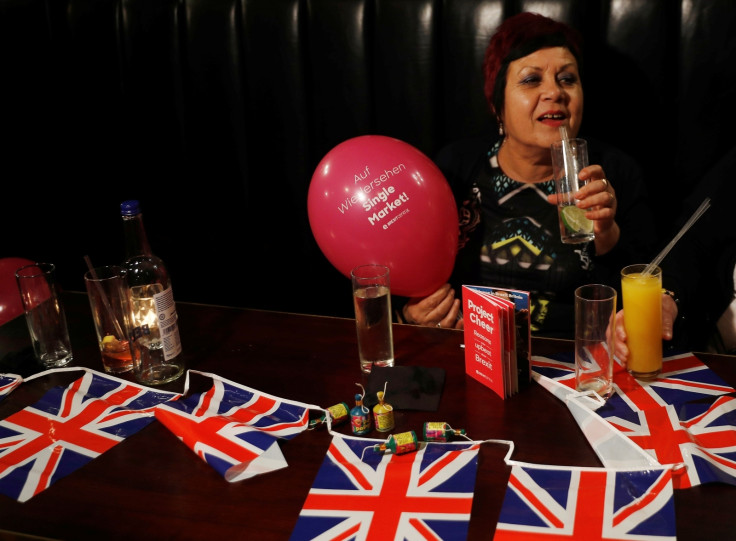 A woman holds a Pro-Brexit balloon in a pub at an event to celebrate the invoking of Article 50 after Britain's Prime Minister Theresa May triggered the process by which the United Kingdom will leave the European Union, in London, Britain March 29, 2017