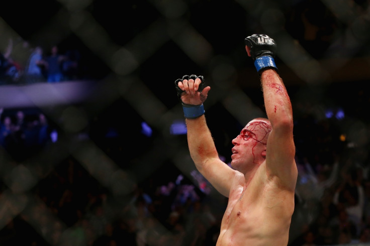 Georges St-Pierre celebrates