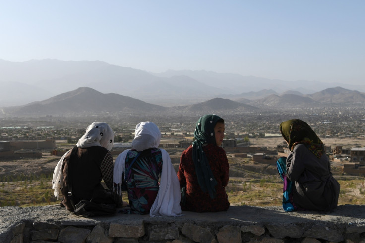Afghan girls looking out to Kabul