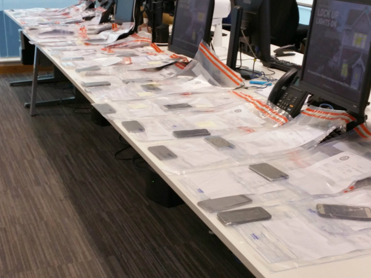 Suspect caught with 53 phones