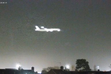 Mystery Object Flashes Over Heathrow Airport Sky Moments Before Passenger Jet Makes Landing