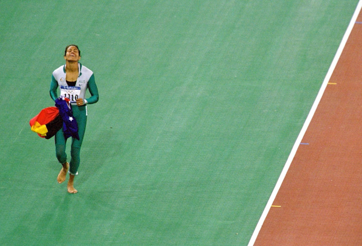 Cathy Freeman of Australia celebrates winning gold in the Womens 400m Final at Australia’s Olympic Stadium during Sydney games in 2000  
