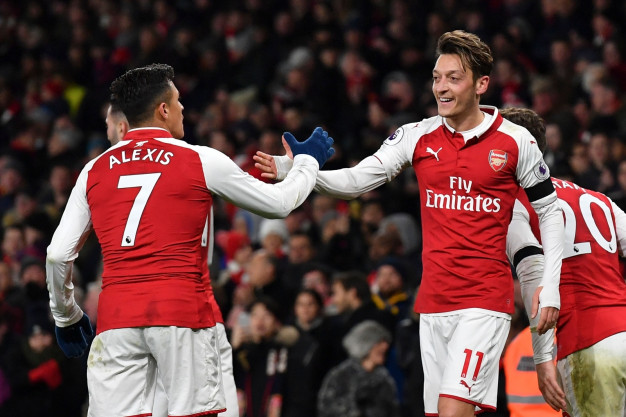 Alexis Sanchez and Mesut Ozil Alexis Sanchez and Mesut Ozil