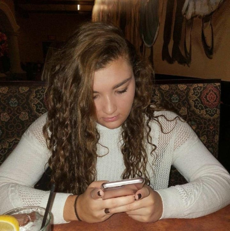 Teen using smartphone
