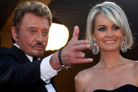 Johnny Hallyday and his wife Laeticia arrive at a screening at the 62nd Cannes Film Festival, in France in 2009