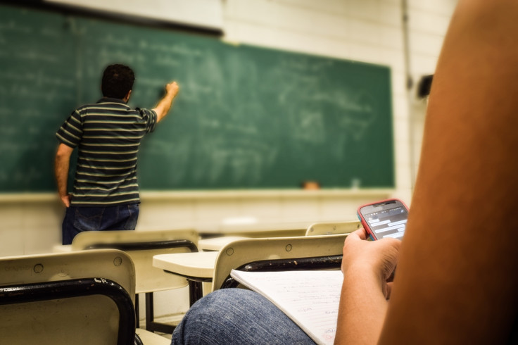 College professor at whiteboard