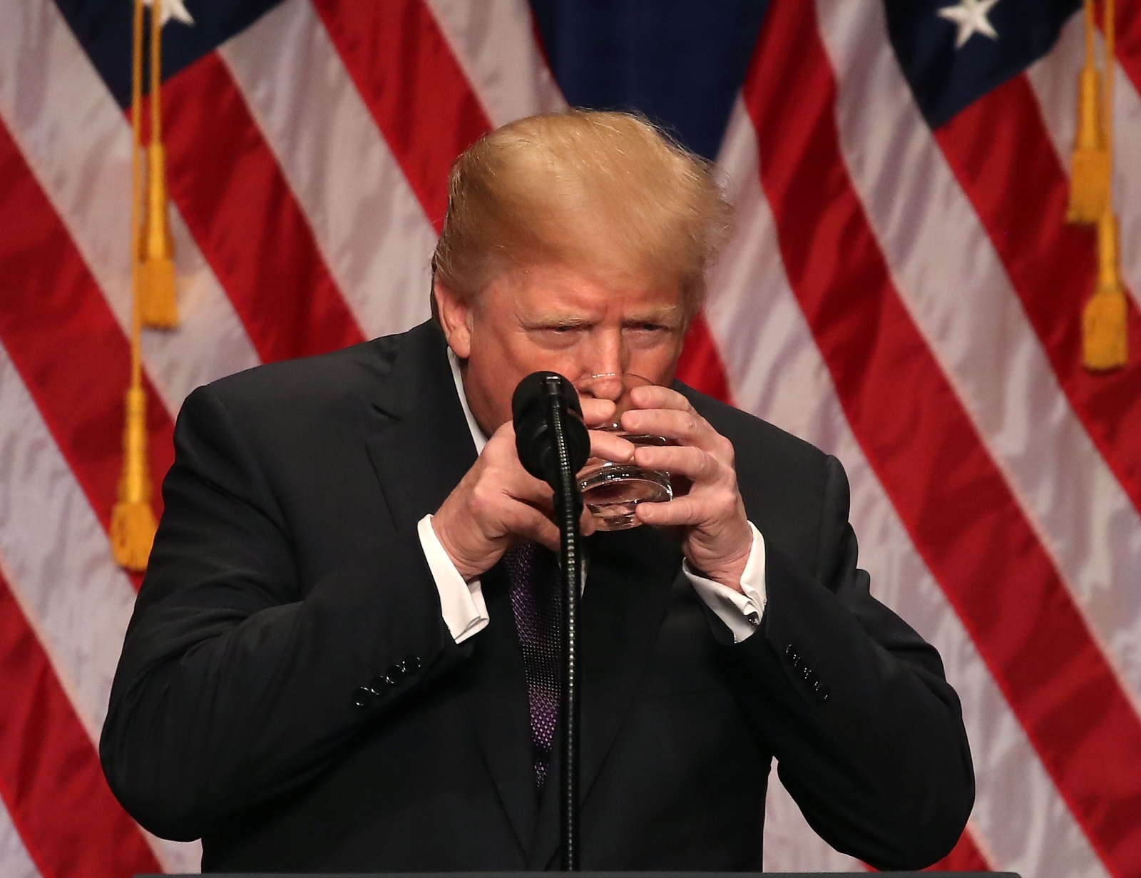 'Get the man a sippy cup': Trump awkwardly drinks water like a child