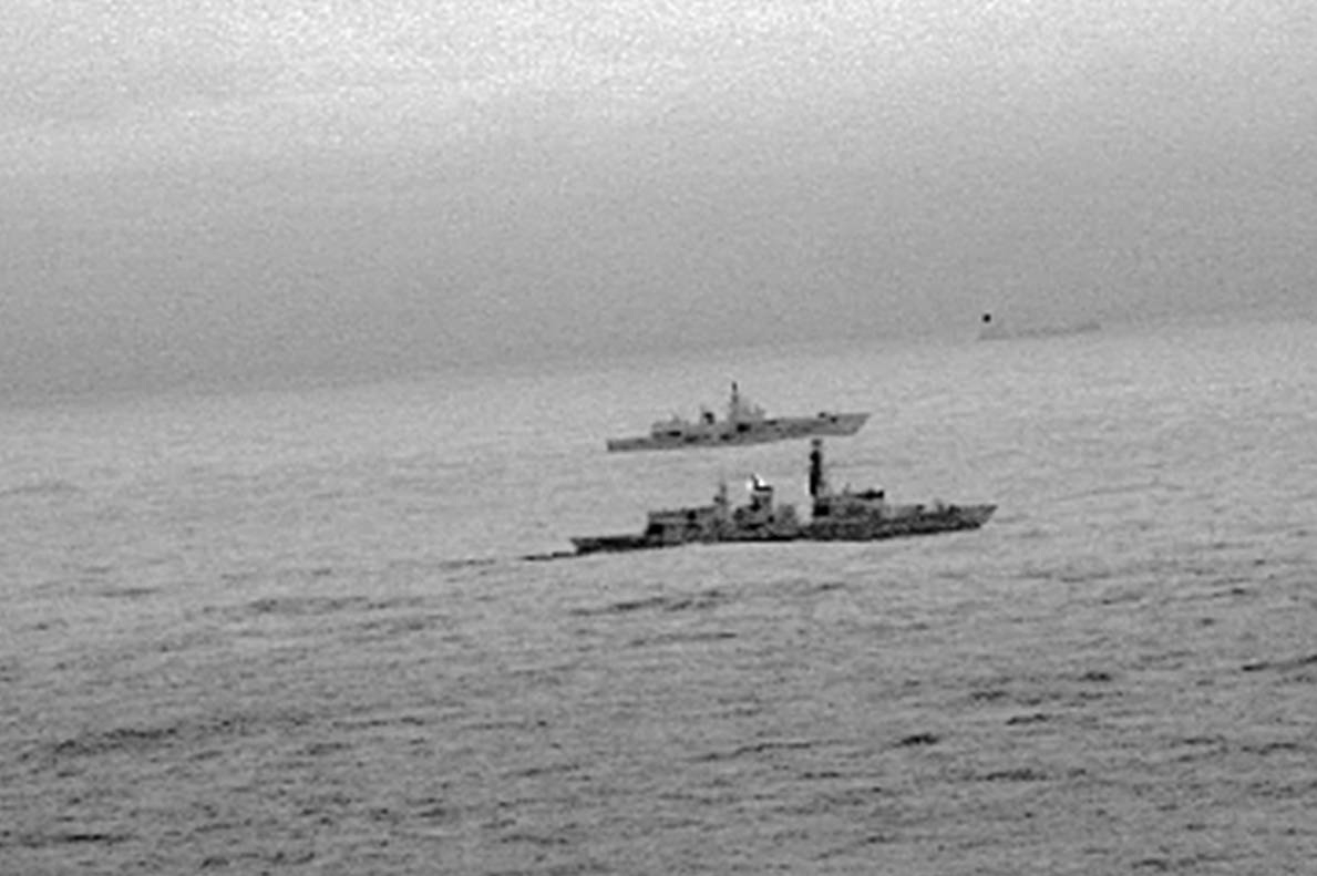 UK frigate and Russian vessel UK frigate and Russian vessel