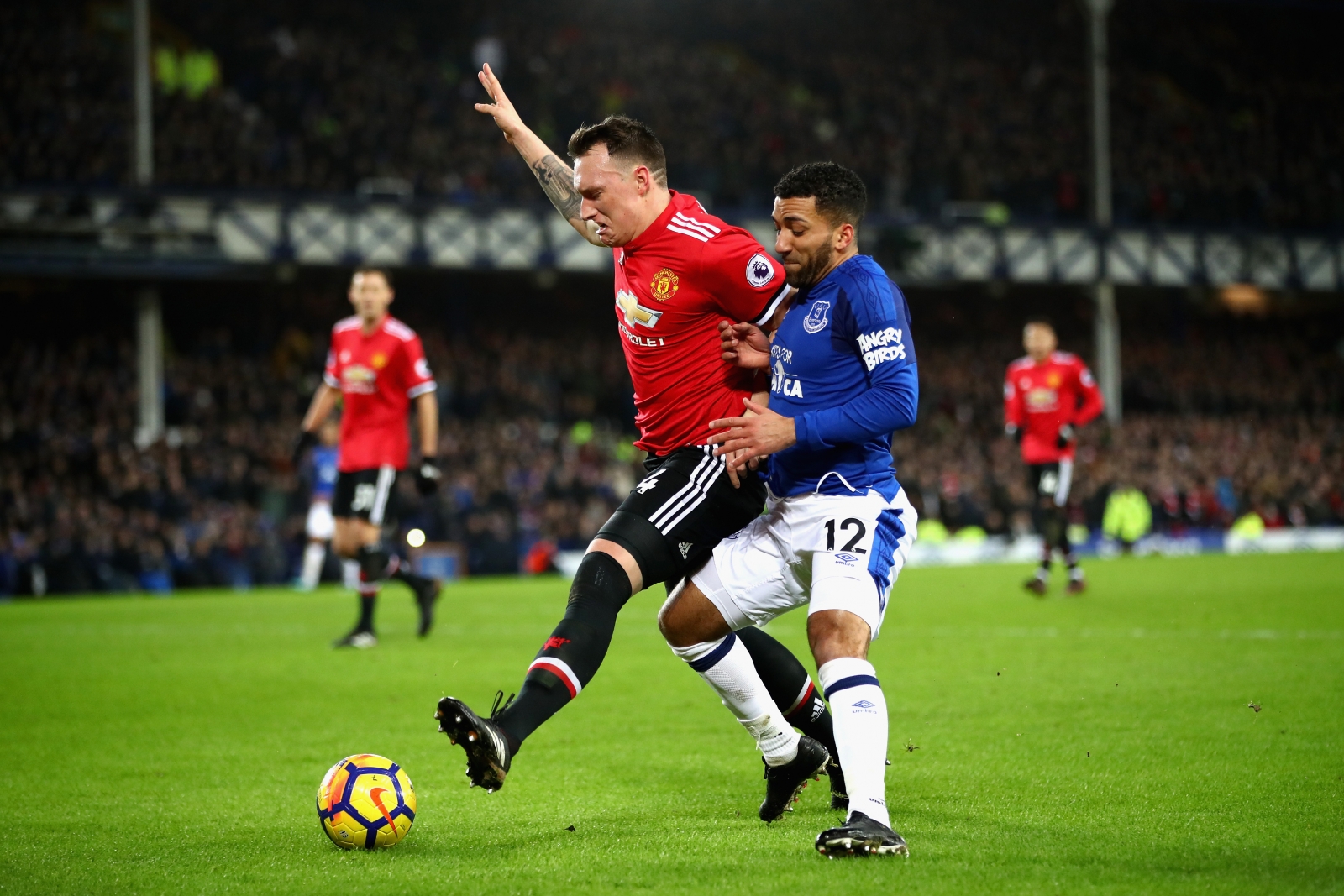 Phil Jones and Aaron Lennon Phil Jones and Aaron Lennon