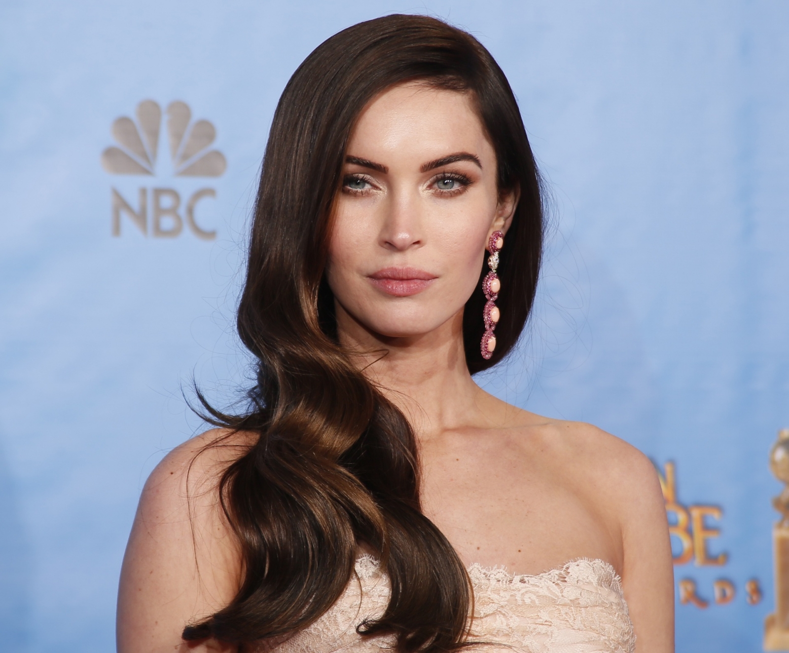 Megan Fox sends temperatures soaring again as she strips to lacy ...