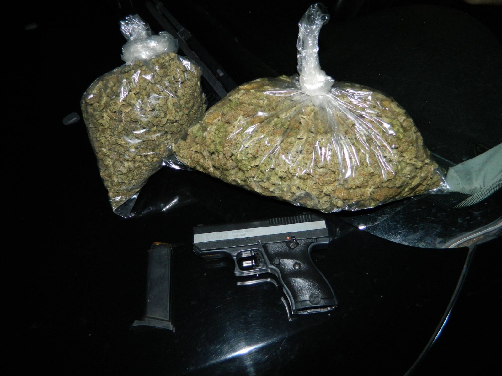 Marijuana and firearm found by police Marijuana and firearm found by police