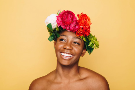 Woman with flower crown smiling