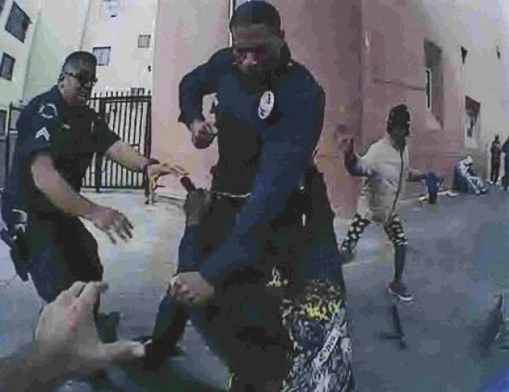 The LAPD released an enhanced image from the footage, claiming it showed the homeless man’s hand on an officer's gun