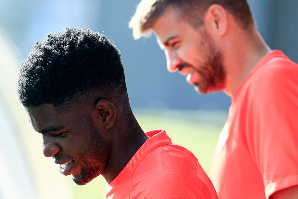 Samuel Umtiti and Gerard Pique Samuel Umtiti and Gerard Pique