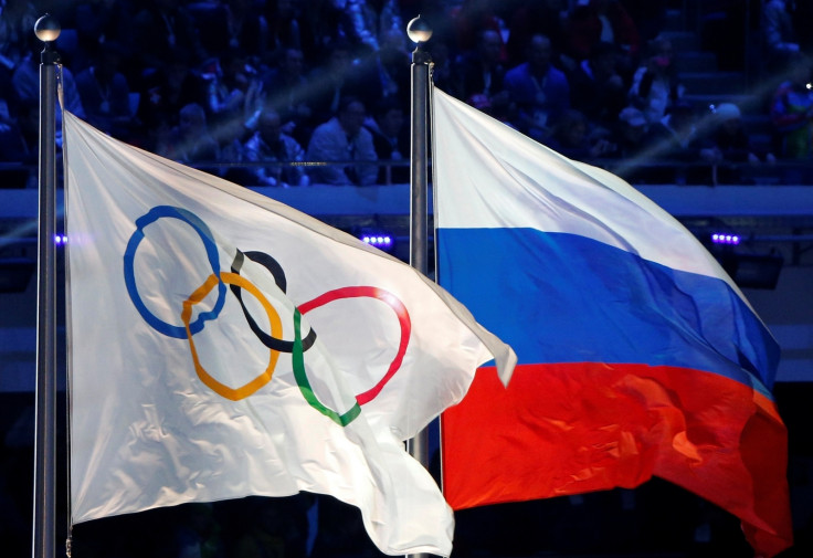 Russian and Olympic flags at Sochi 2014