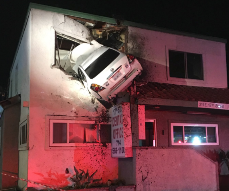 Car crashes into house